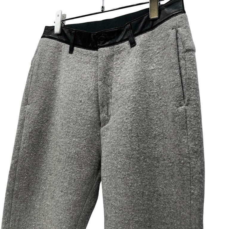 ISAMU KATAYAMA BACKLASH 圧縮ウールジャージーウエストレザーテーパードパンツ ボトムス 定価38,800円 イサムカタヤマ バックラッシュ メンズ