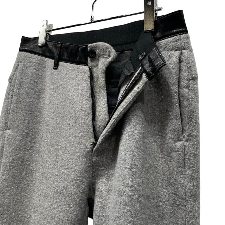 ISAMU KATAYAMA BACKLASH 圧縮ウールジャージーウエストレザーテーパードパンツ ボトムス 定価38,800円 イサムカタヤマ バックラッシュ メンズ