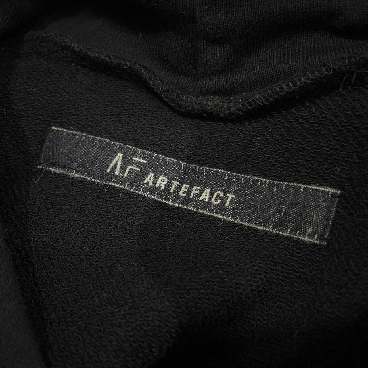 A.F ARTEFACT ナンバリングプリントラグランスリーブオーバーサイズパーカー フーディ トップス エーエフ アーティファクト メンズ