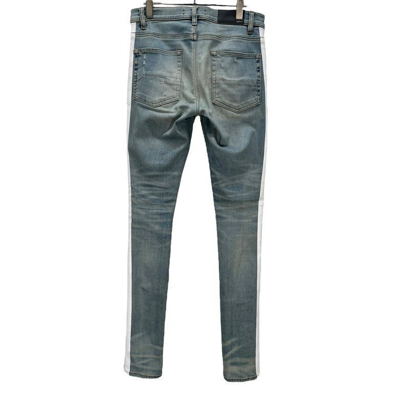 AMIRI ダメージウォッシュ加工サイドラインプリントストレッチスキニーデニムパンツ スリムシルエット ボトムス 側章 ストライプ アミリ メンズ