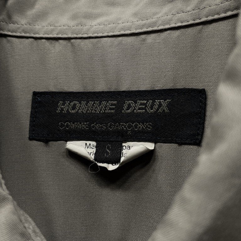 COMME des GARCONS HOMME DEUX 25SS ランダムボタン製品染めポリエステルシャツ ブラウス DO-B047 AD2024 トップス 半袖 コムデギャルソン オム ドゥ メンズ