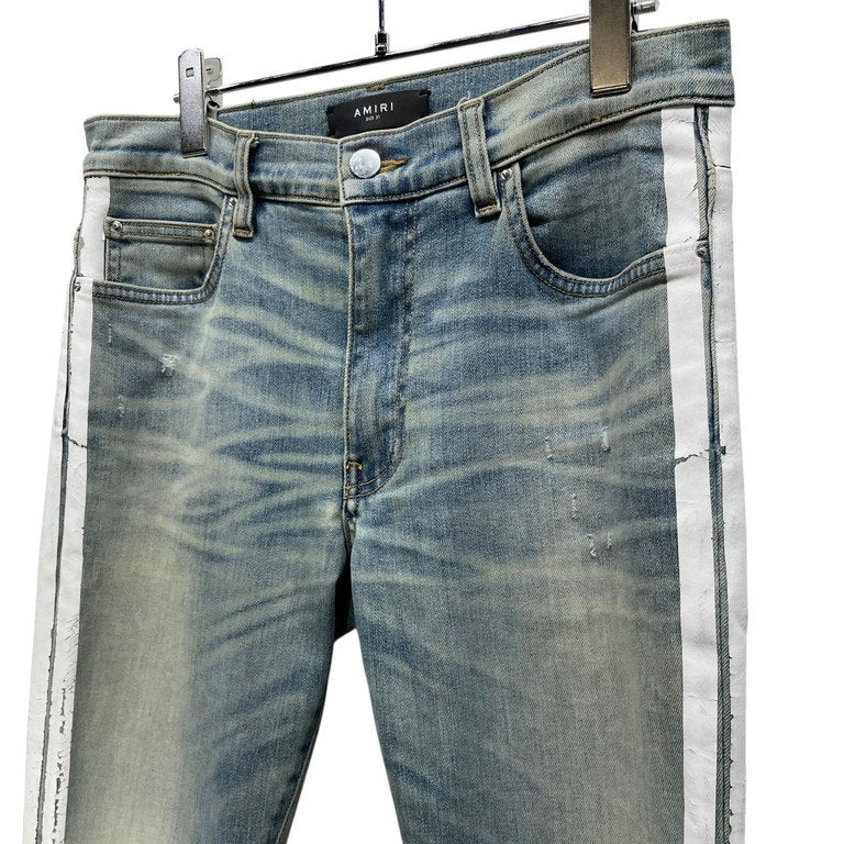 AMIRI ダメージウォッシュ加工サイドラインプリントストレッチスキニーデニムパンツ スリムシルエット ボトムス 側章 ストライプ アミリ メンズ